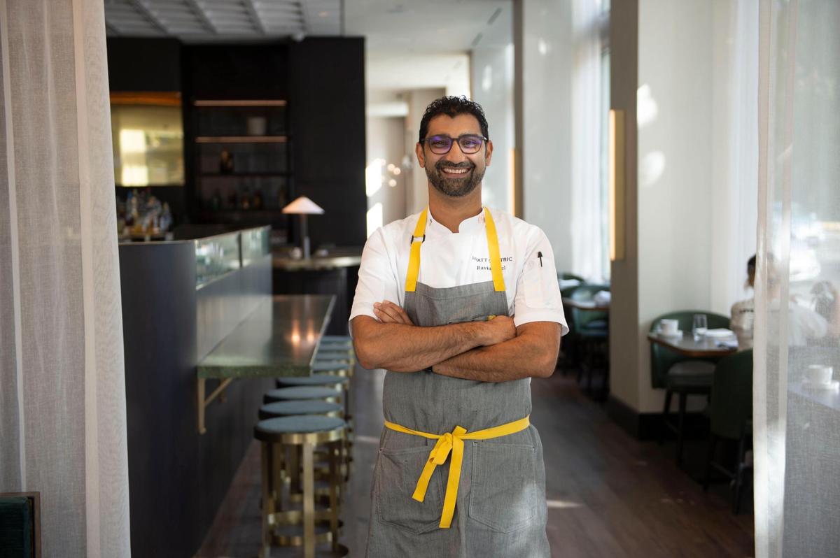 7th Street Standard chef Ravin Patel stands for a portrait in the restaurant’s dining room inside the newly opened Hyatt Centric hotel on Thursday, Nov. 11, 2021. Patel was formerly with Sellands Family Restaurants.