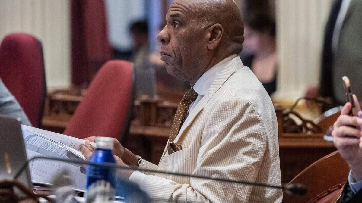State Sen. Steven Bradford, D-Gardena, listens during a Senate session at the state Capitol on Friday. Bradford was waiting to see if two reparations bills would pass in the Assembly.