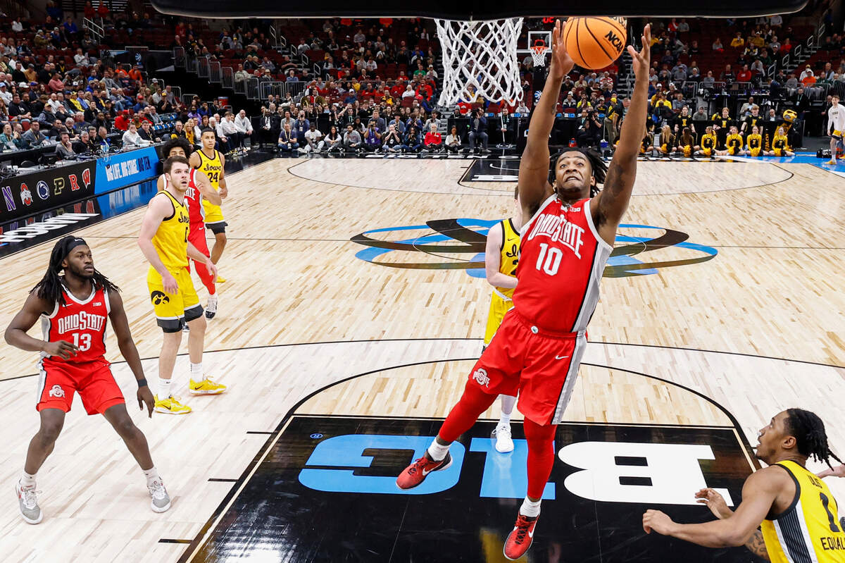 Ohio State Buckeyes forward Brice Sensabaugh (10) grabs a rebound against the Iowa Hawkeyes during the first half March 9, 2023, at United Center in Chicago, Illinois.