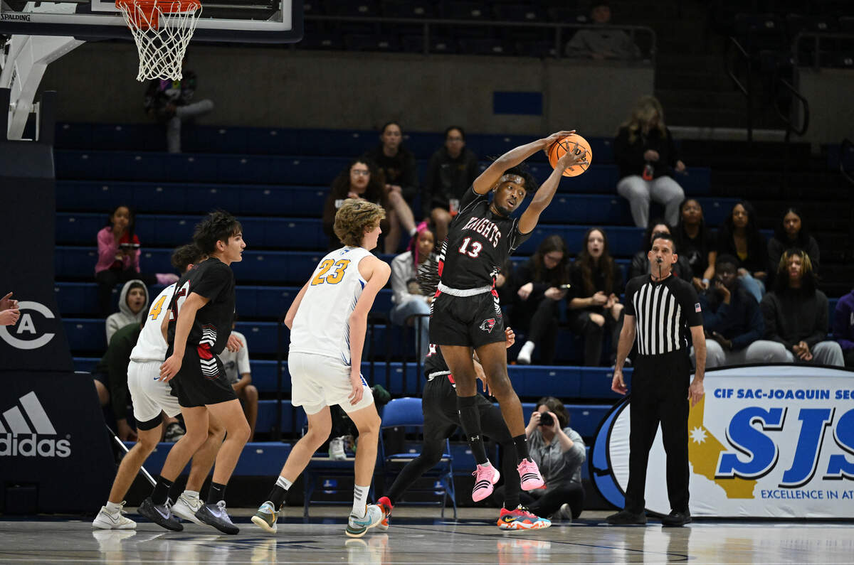 Futures’ EJ George grabs a rebound during the Sac-Joaquin Section Division V title game against Ripon Christian at UC Davis on Friday.