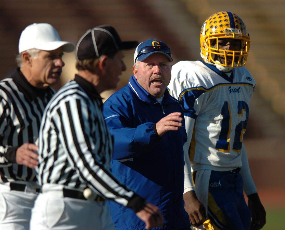Grant Pacers head coach Mike Alberghini argues with referees in 2005 after a Grant touchdown was called back in the first quarter in a City Championship Game against Nevada Union at Hughes Stadium in Sacramento. Alberghini was ejected in the fourth quarter for unsportsmanlike conduct.