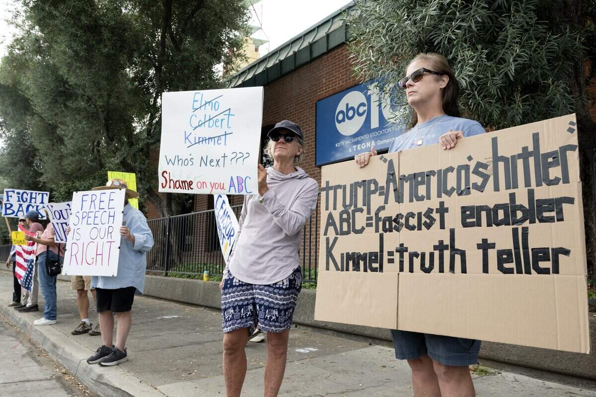 Suzanne Auchterlonie, center, protests the removal of late-night talk host Jimmy Kimmel outside of ABC10 (KXTV) on Broadway in Sacramento on Thursday. Kimmel was pulled by the ABC network indefinitely for remarks about the politics of the man who is accused of killing conservative activist Charlie Kirk. Channel 10 is an affiliate owned by Tegna.