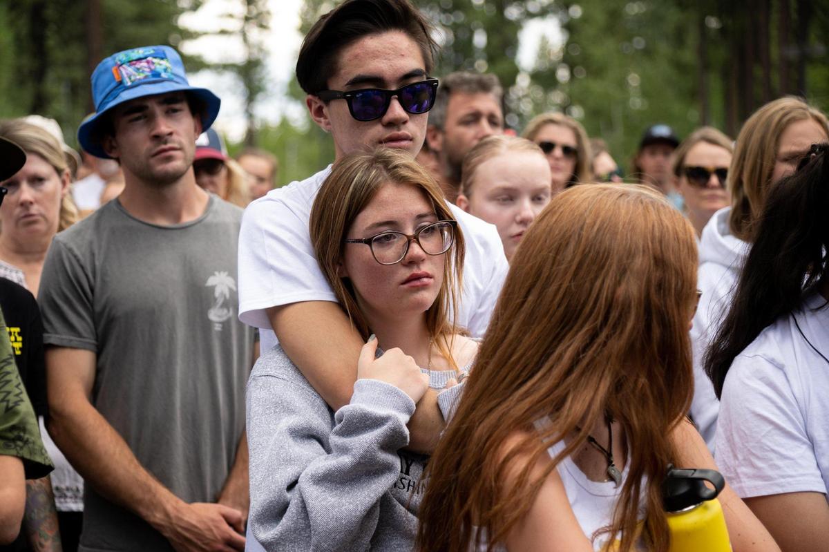Community members listen to law enforcement during a press conference, Tuesday, August 9, 2022 in Truckee. Authorities are searching for 16-year-old Kiely Rodni or her Honda CR-V after she went missing Saturday from Prosser Family Campground near Truckee.