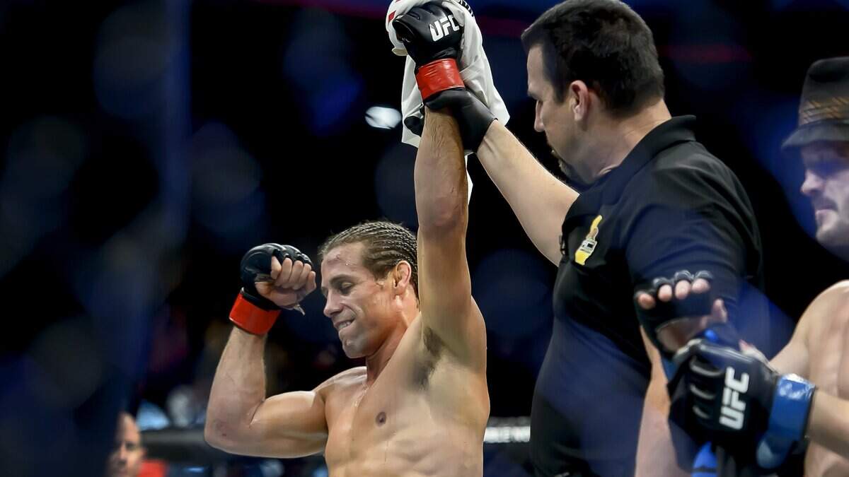 Urijah Faber has his arm raised in victory over Brad Pickett on Dec. 17, 2016, at Golden 1 Center. UFC is returning to Sacramento on Saturday, July 13.