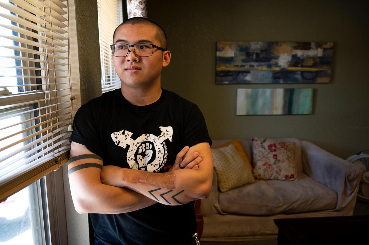 Ryan Tieu, photographed at home on Friday, Aug. 2, 2019, is a 24-year-old first-generation Vietnamese American and transgender person. Ryan’s mother Tracy Nguyen supported Ryan through therapy sessions and transitional surgery during high school.