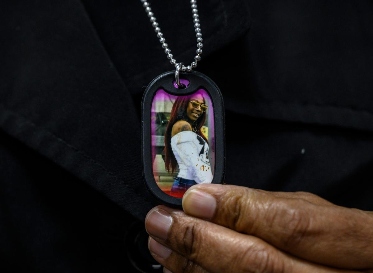 Lorrie Johnson wears a necklace with a picture of her late granddaughter Dajha Richards, 19, Sunday, Feb. 10, 2019 in Sacramento.
