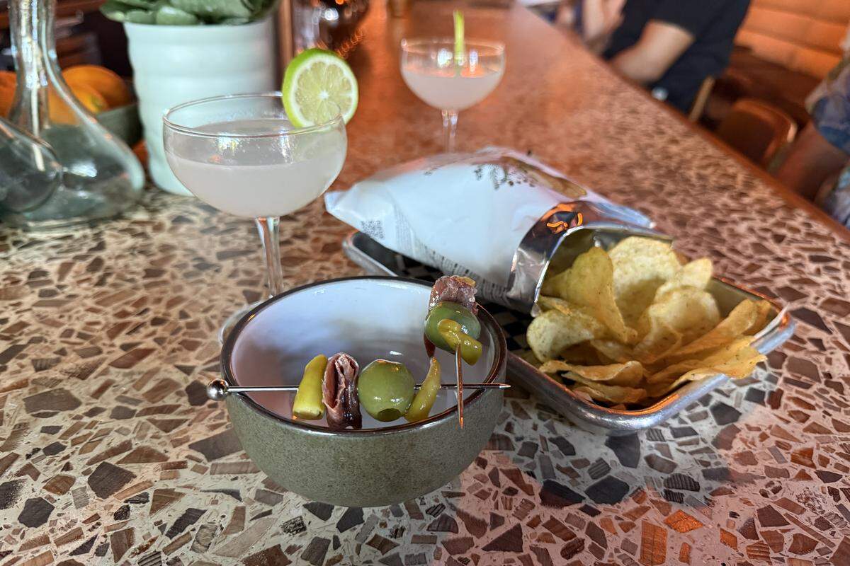 Daiquiris are paired with Mediterranean herbed potato chips and gildas, a Spanish snack of skewered anchovy, olive and pickled pepper on Friday, March 20.