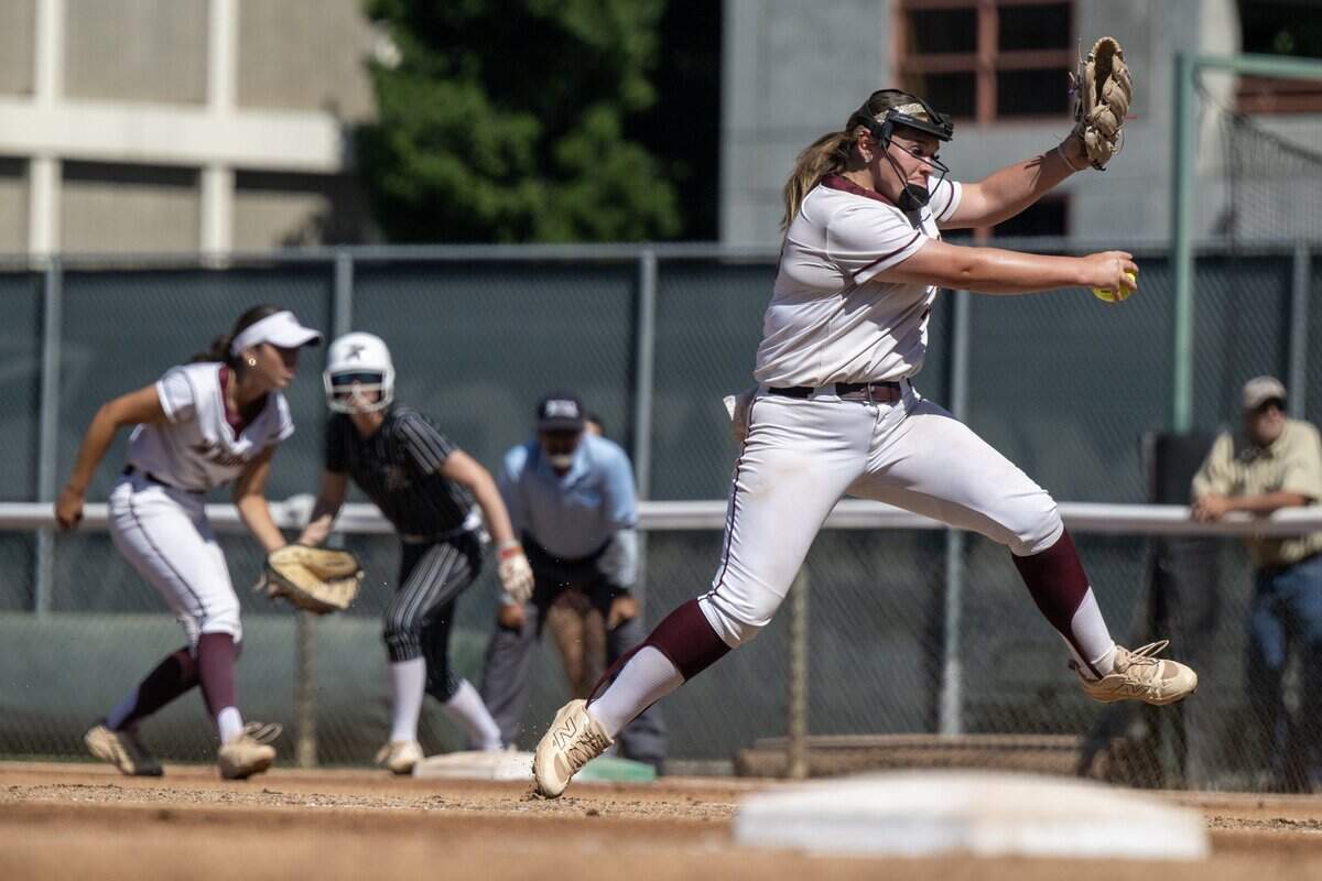 Whitney Wildcats pitcher Taylor Cordell delivers a pitch in the second inning against the Rodriguez Mustangs on Saturday in the CIF Sac-Joaquin Section Division I softball championship at Sacramento State.