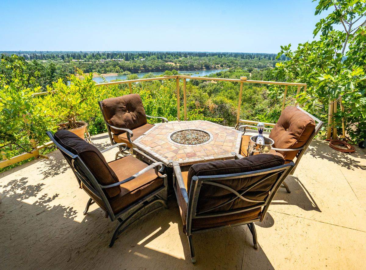 The condo has two private balconies, one located off the living room and the other is off an open-concept primary bedroom suite, Thursday, May 25, 2023.