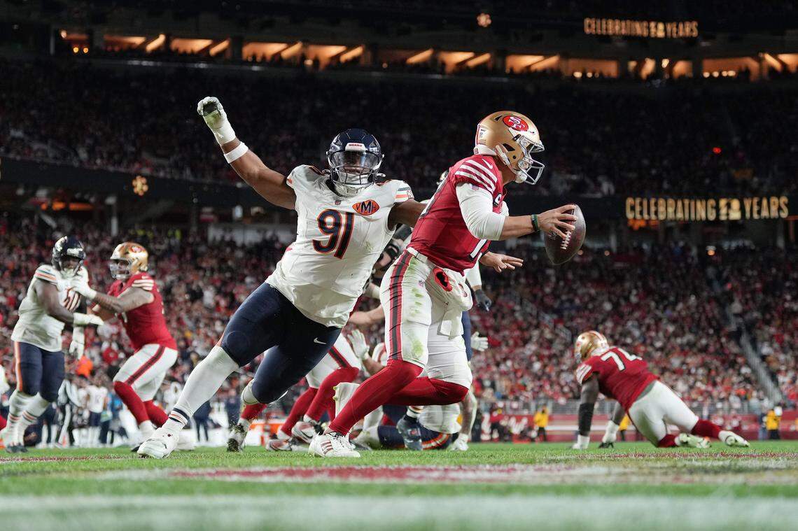 SANTA CLARA, CALIFORNIA - DECEMBER 28: Brock Purdy #13 of the San Francisco 49ers scrambles under pressure from Chris Williams #91 of the Chicago Bears during the second quarter of the game at Levi's Stadium on December 28, 2025 in Santa Clara, California. (Photo by Thearon W. Henderson/Getty Images)