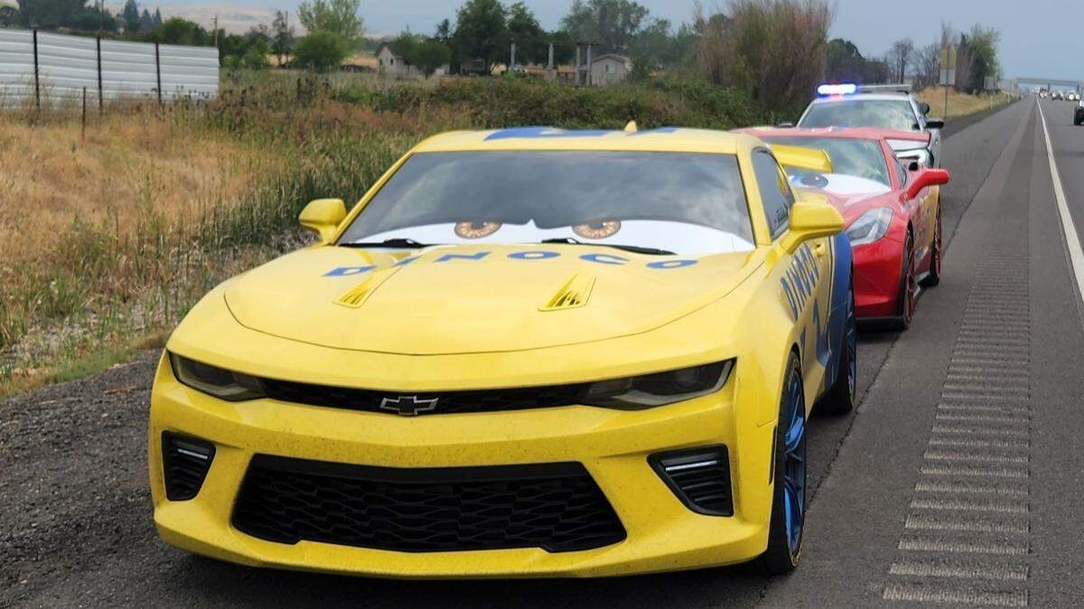 Lightning McQueen and Cruz from the Pixar series “Cars” were pulled over by state troopers in Oregon. (Photo from Oregon State Police)