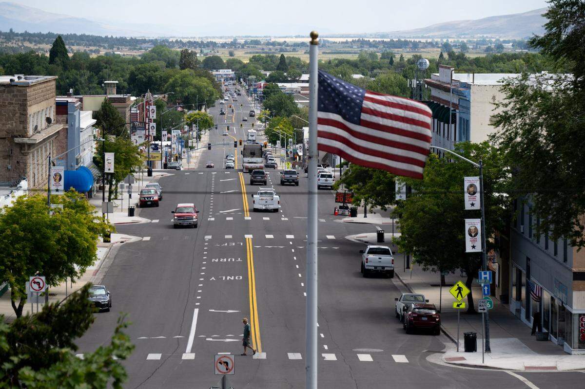 Cars travel on Main Street through Susanville, a Northern California town of 17,500 residents, in August. Resident Bradley Earl Reger is suspected of molesting boys in the community and on his travels worldwide. Since Reger’s arrest, 40 to 50 potential victims have surfaced according to the FBI.