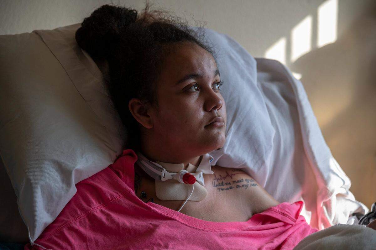 Felicia Brent-Velasquez, 18, sits in a hospital bed in February while recovering at home from a car accident that left her a quadriplegic. Prior to the accident when she was at the county’s foster care placement facility on the Auburn Boulevard campus and she said she only needed to ask security to have staff open the gate and she would walk right out and go AWOL.