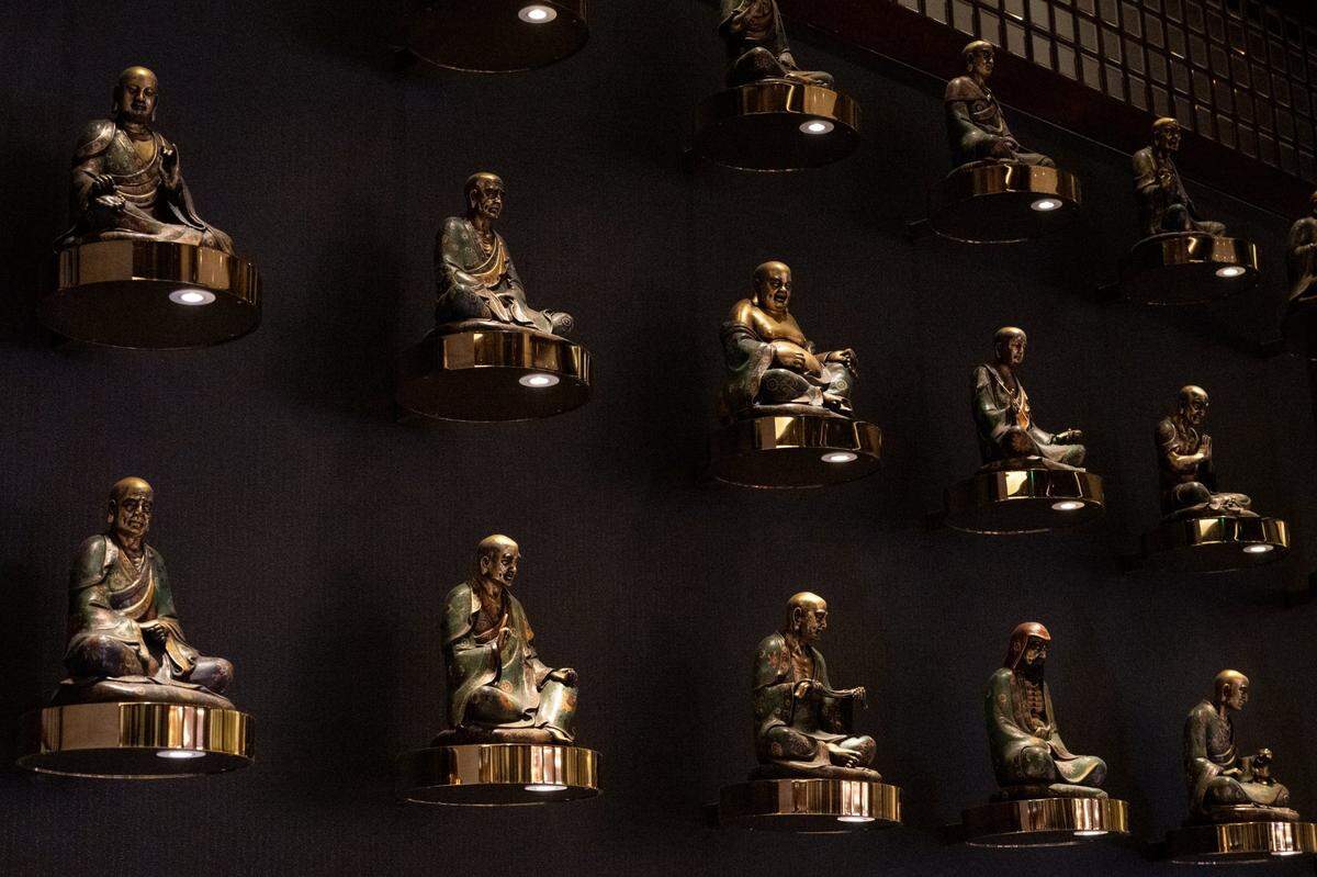 Buddhas decorate the bar at Dragon Beaux restaurant at Sky River Casino on Tuesday.