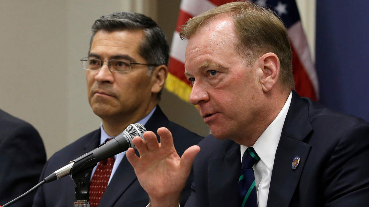 McGregor Scott, right, the United States Attorney for the Eastern District of California, accompanied by California Attorney General Xavier Becerra, discusses an increase in the use of a banned pesticide at illegal marijuana farms hidden on public lands Tuesday, May 29, 2018, in Sacramento, Calif. Researchers found the highly toxic pesticide Carbofuran, which can’t legally be used in the Unites States, at 72 percent of grow sites last year, up 15 percent from 2012. (AP Photo/Rich Pedroncelli)