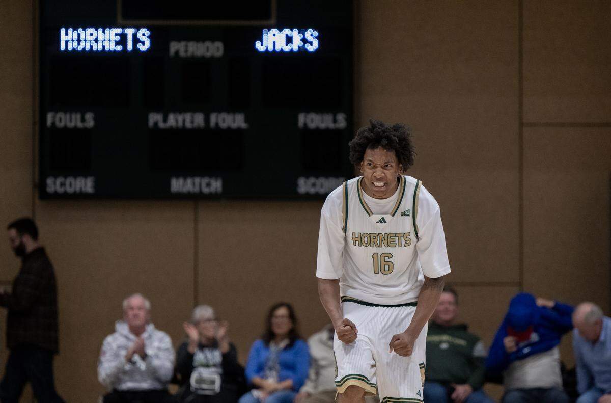 Sacramento State Hornets guard Prophet Johnson (16) celebrates following the Hornets 83-69 victory over the Northern Arizona Lumberjacks on Thursday in Sacramento.