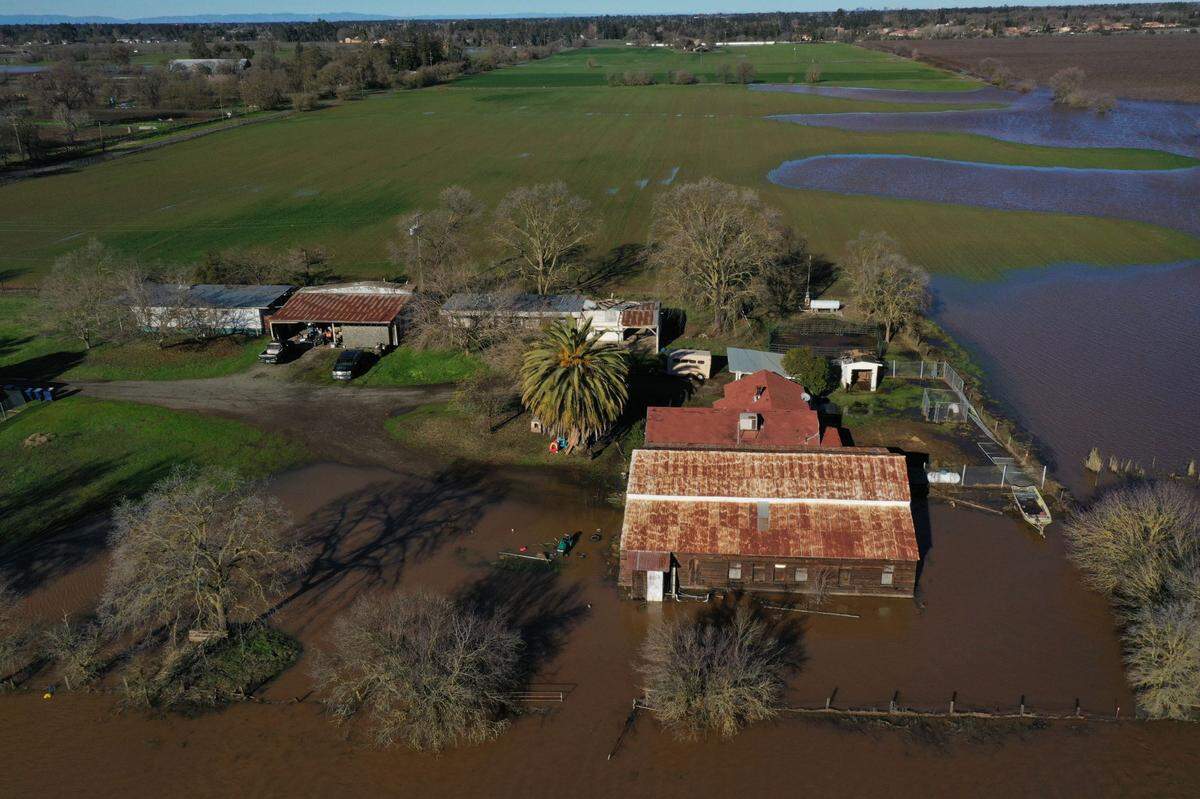 A farm on Freeman Road south of Elk Grove is partially flooded on Sunday. A levee failure was reported nearby.