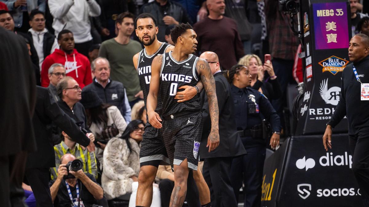 Sacramento Kings guard Malik Monk (0), right, is led by forward Trey Lyles (41) away from a skirmish with Houston Rockets guard Garrison Mathews (25) during the fourth quarter of the NBA basketball game Friday, Jan. 13, 2023, at Golden 1 Center in Sacramento.