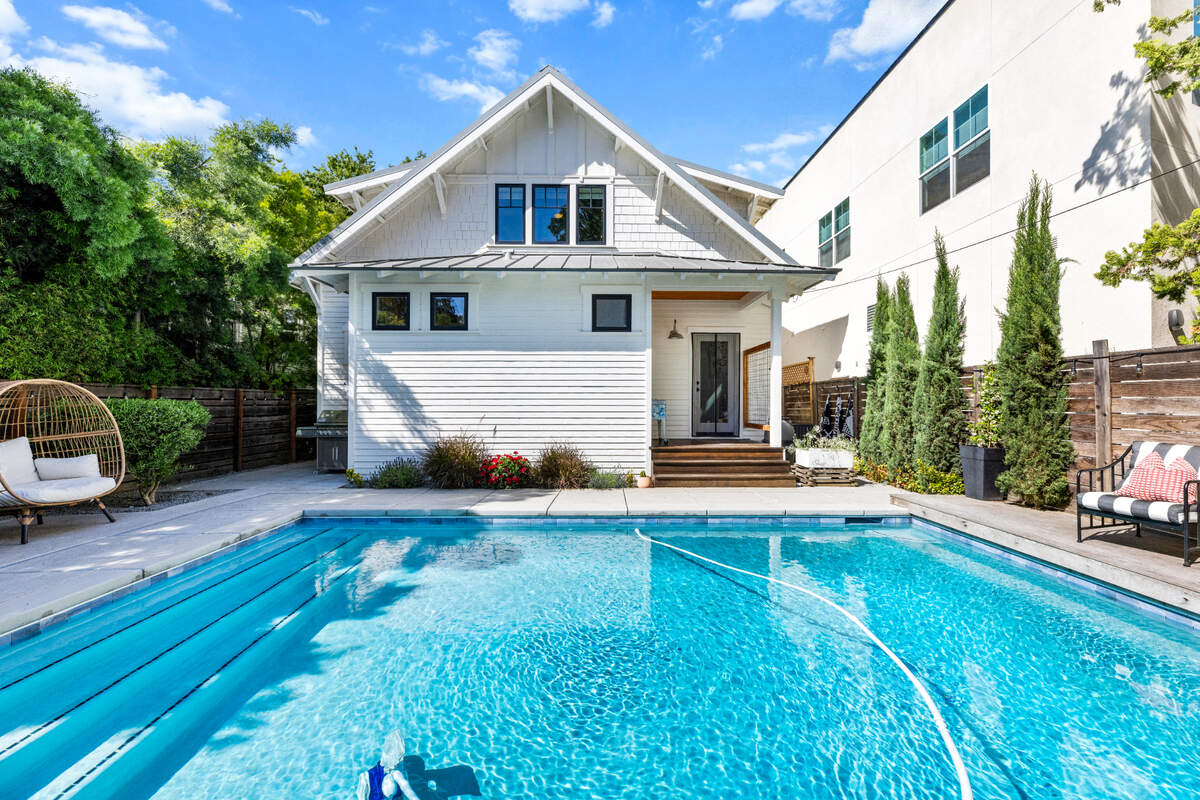 The Curtis Park home has a pool and a guest house above a detached garage.