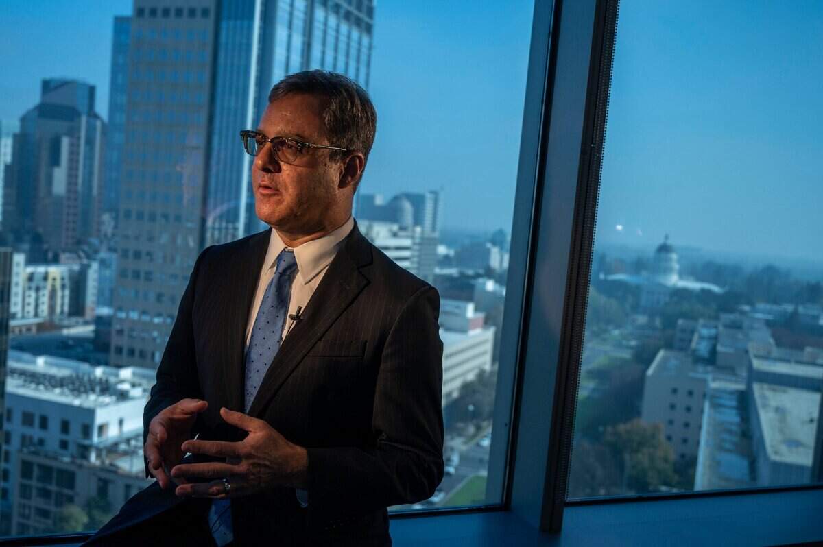 Sacramento attorney Matthew Segal stands on Friday, Nov. 12, 2021 in his new office at Stoel Rives LLP, where he will focus on white-collar crime, antitrust cases and internal government investigations. Over 17 years, Segal rose from assistant U.S. attorney to chief of the special prosecutions unit in the Sacramento-based Eastern District of California, where he handled some of the office’s most complex and unusual cases.