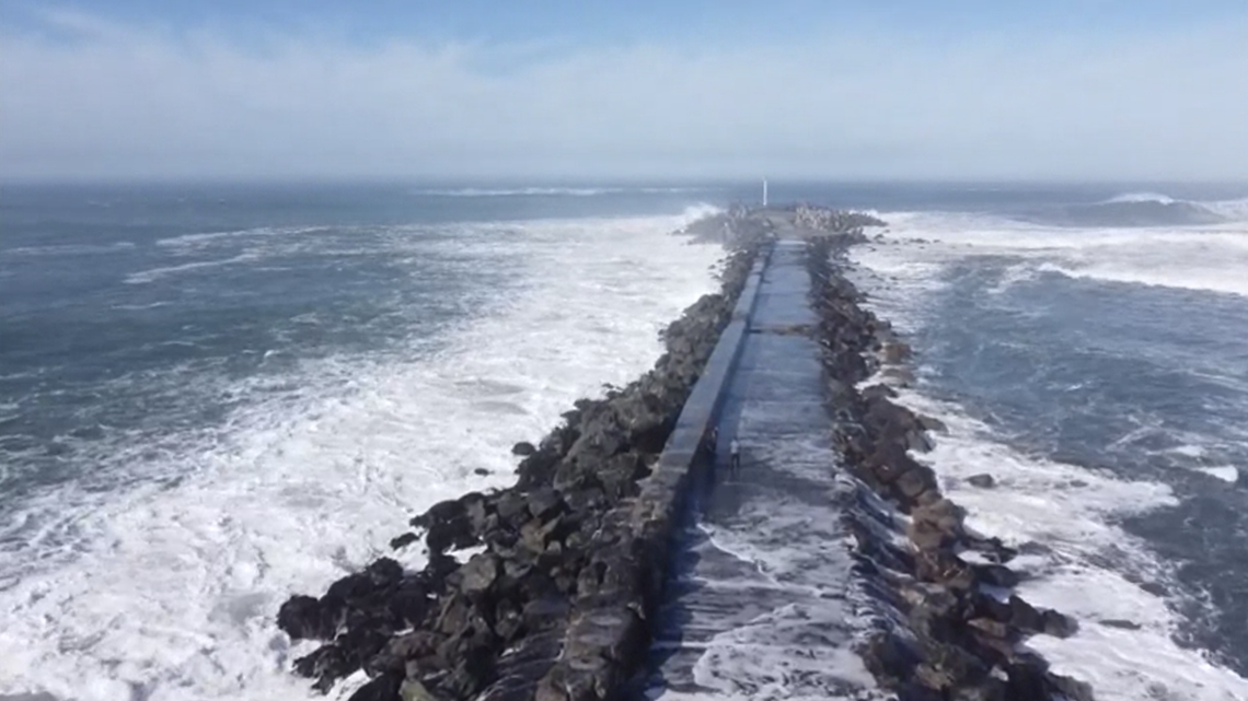 A woman was visiting Humboldt Bay in California with her son and died after a wave swept her out to sea, the Humboldt County Sheriff’s Office said.