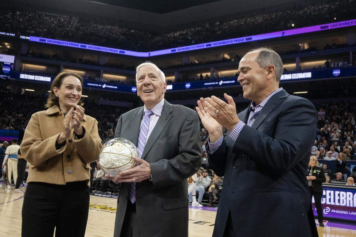 Sacramento Kings announcer Gary Gerould is celebrated during a timeout in the first half against the Golden State Warriors on Friday.
