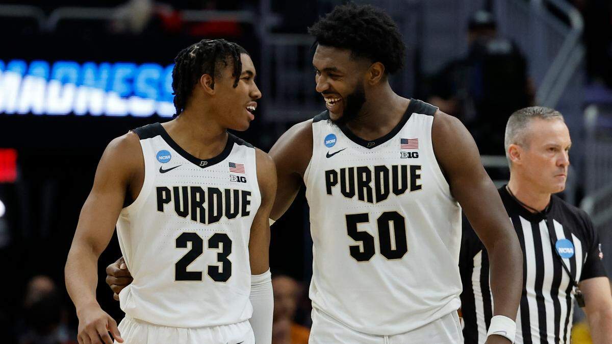 Purdue’s Jaden Ivey and Trevion Williams celebrate during the second half of a second-round NCAA college basketball tournament game against Texas Sunday, March 20, 2022, in Milwaukee. Purdue won 81-71. (AP Photo/Jeffrey Phelps)