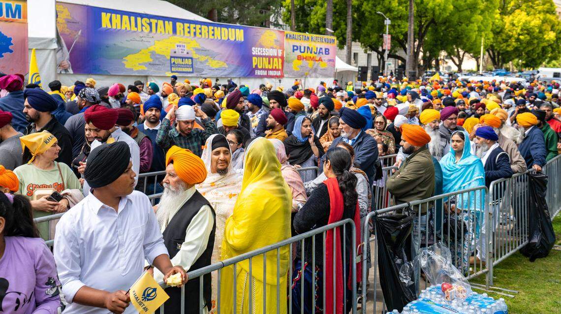 Thousands of Sikhs wait in line to vote in the Khalistan referendum at the state Capitol building on Sunday.