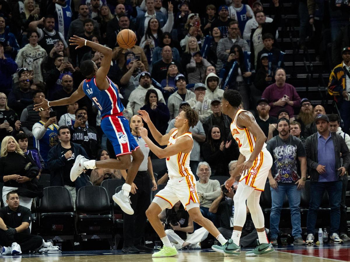 Atlanta Hawks guard Dyson Daniels (5) strips the ball from Sacramento Kings guard De’Aaron Fox (5) on his last shot during an NBA game at Golden 1 Center on Monday, Nov. 18, 2024.