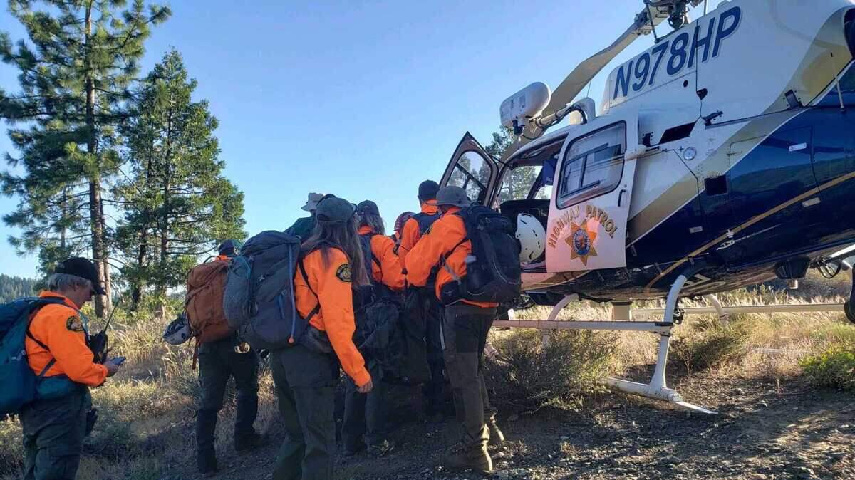 Nevada County Sheriff’s Search and Rescue loading a man into a helicopter. The man fell nearly 70 feet, breaking his hip and ribs. His dog flagged down search and rescue personnel for him.