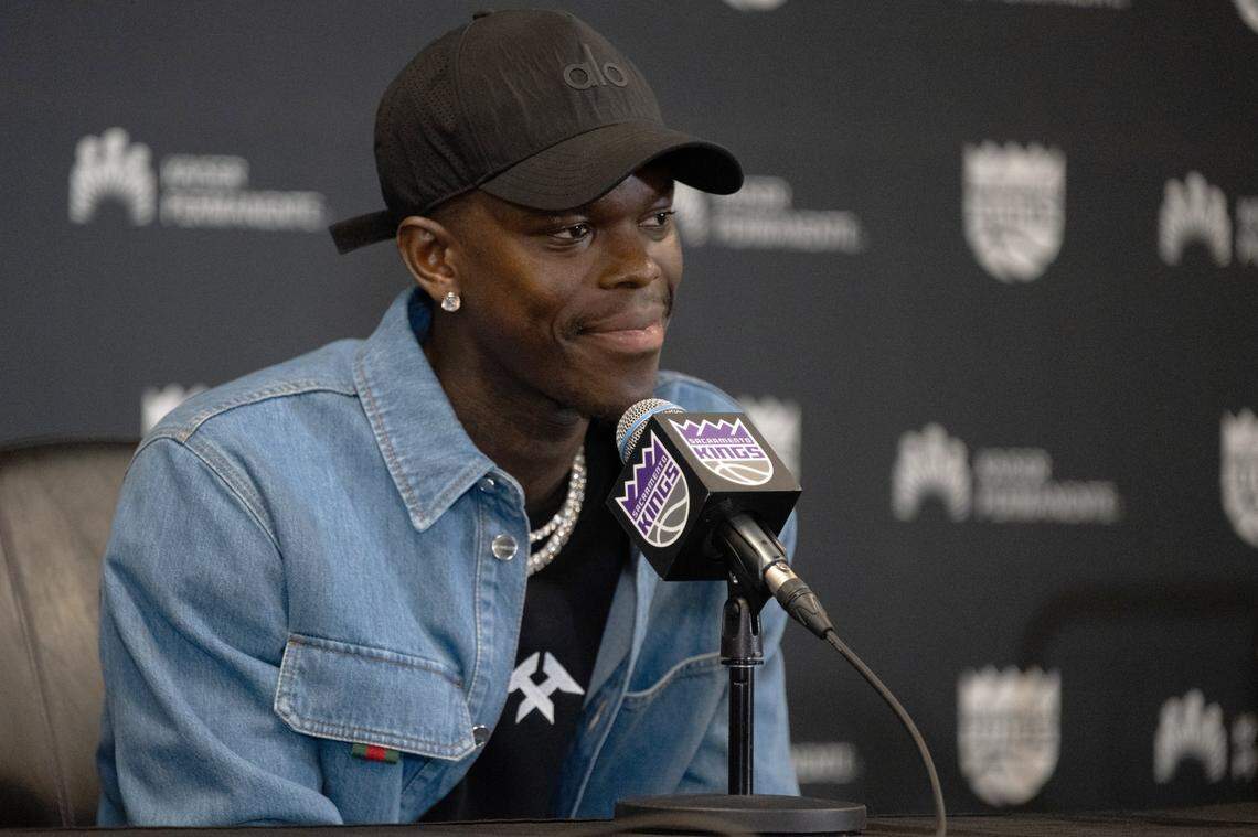 New Sacramento Kings player Dennis Schröder is introduced by General Manager Scott Perry at a news conference at Golden 1 Center on Tuesday.