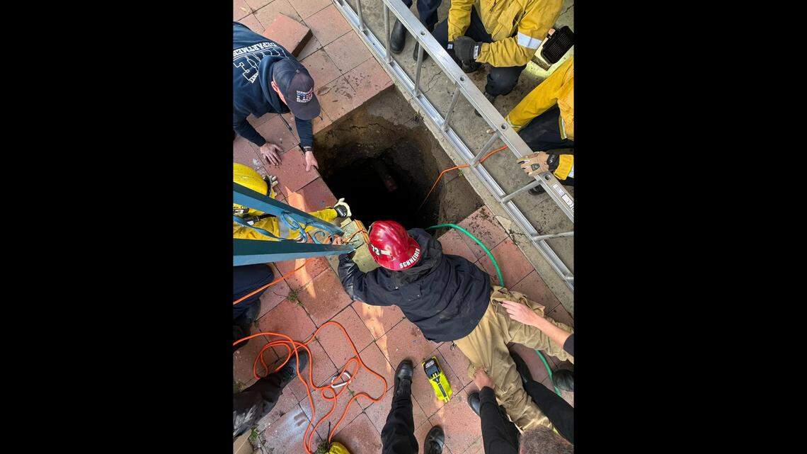A Fontana woman was rescued after falling into a 25-foot-deep sinkhole outside a mobile home, California firefighters say.
