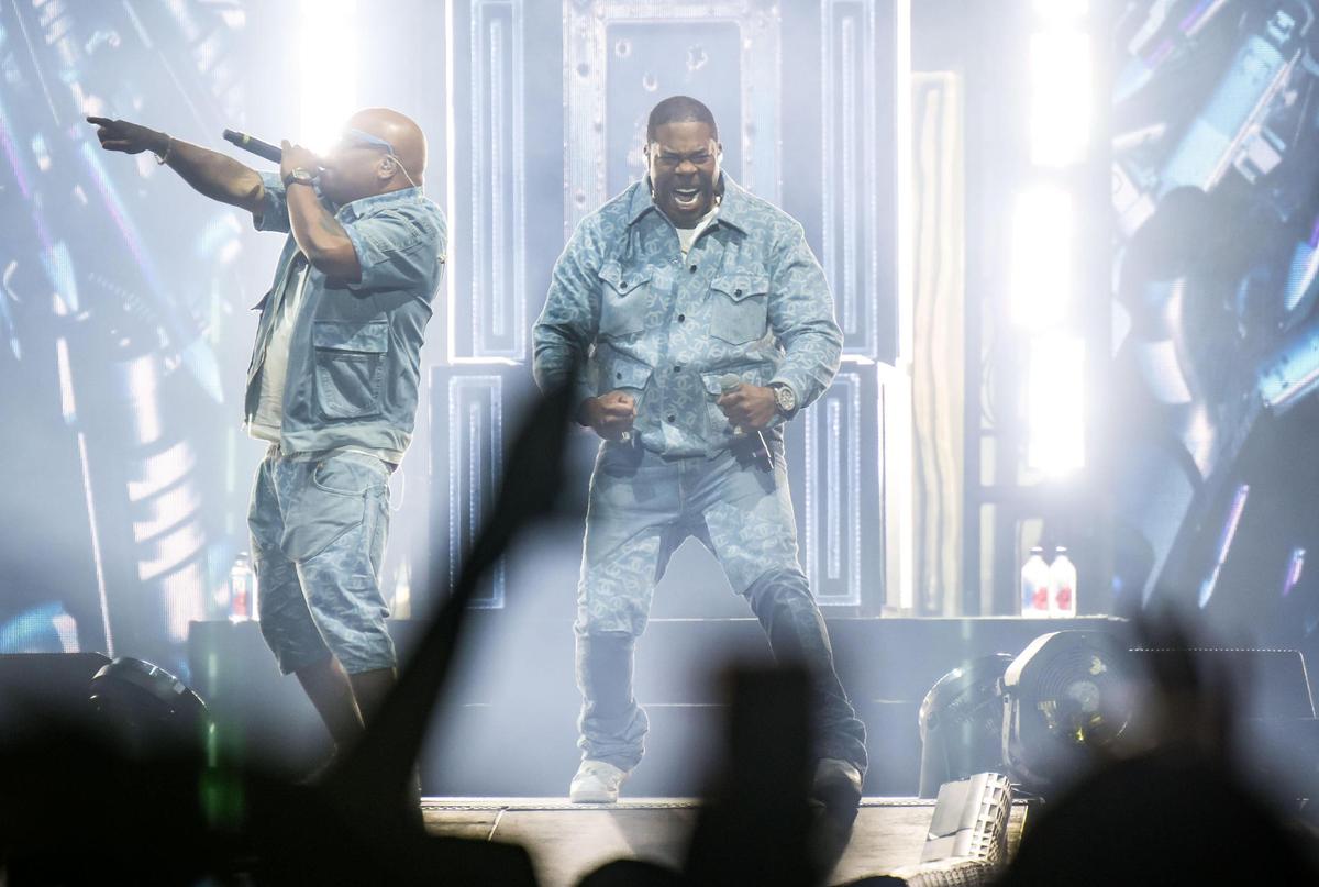Busta Rhymes, right, accompanied by Spliff Star, performs “Ante Up” before headliner Curtis “50 Cent” Jackson on The Final Lap Tour, also featuring Jeremih, at Golden 1 Center on Monday, Sept. 4, 2023, in Sacramento. Hype man Spliff Star