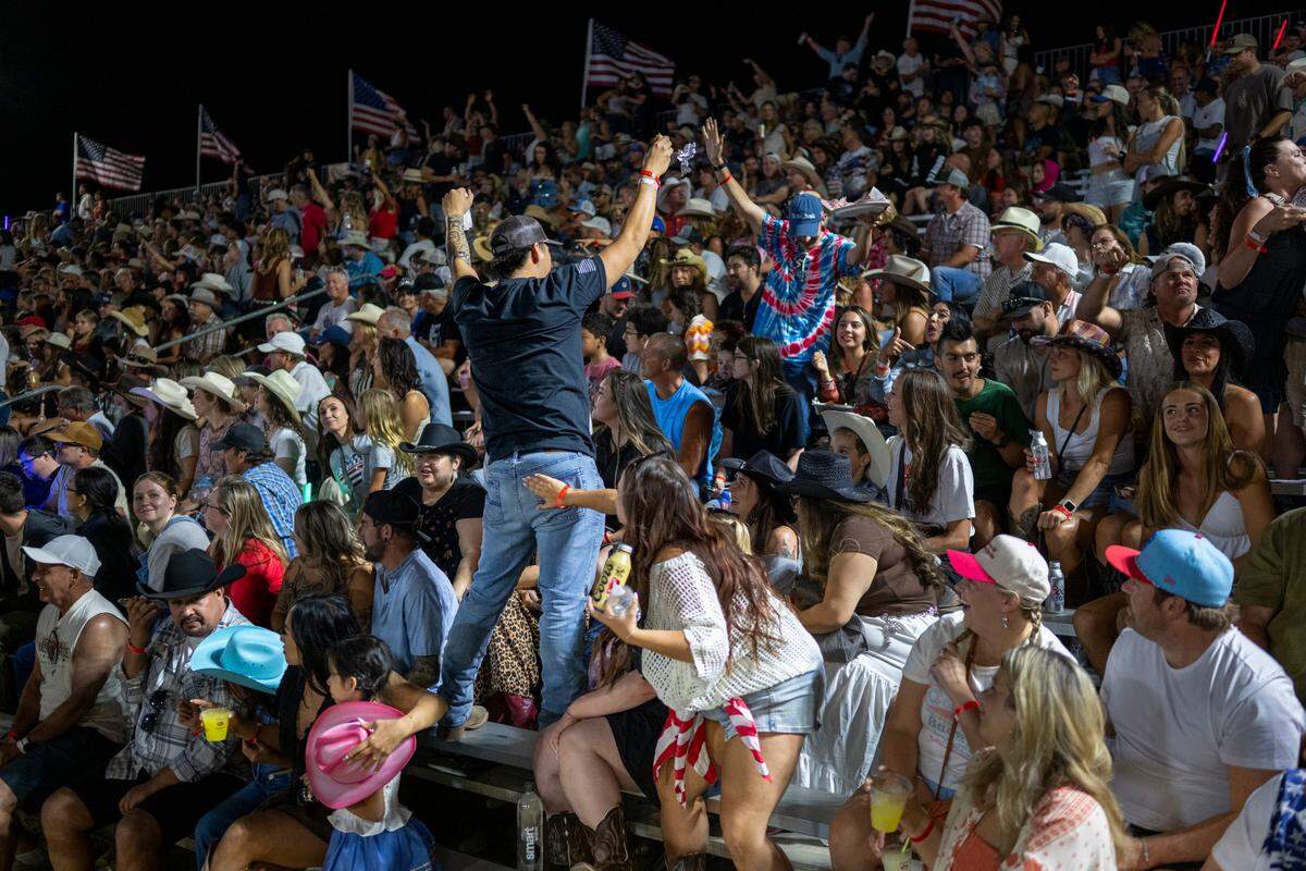 Spectators enjoy themselves during the sold-out Folsom Pro Rodeo on Thursday.