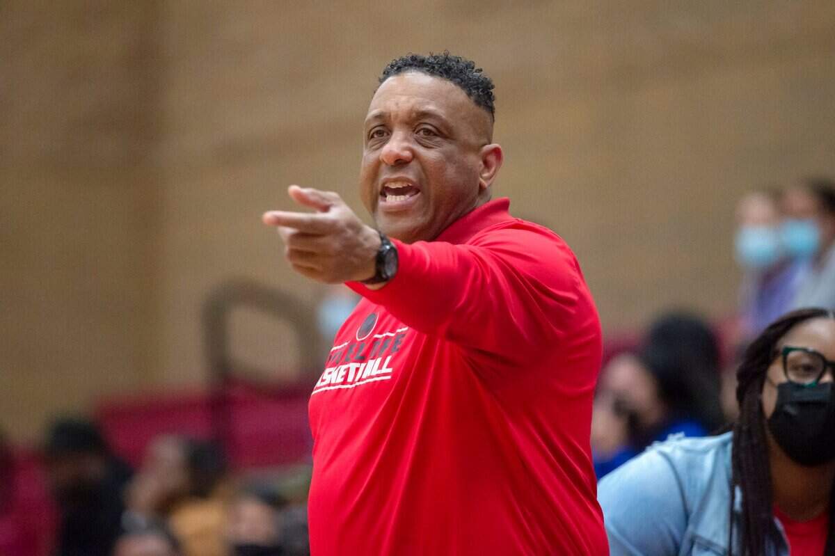 Antelope Titans coach Sean Chambers calls out to his players during the first quarter at the Sac-Joaquin Section Division II quarterfinal on Monday at Antelope High School. The Titans won 56-36.