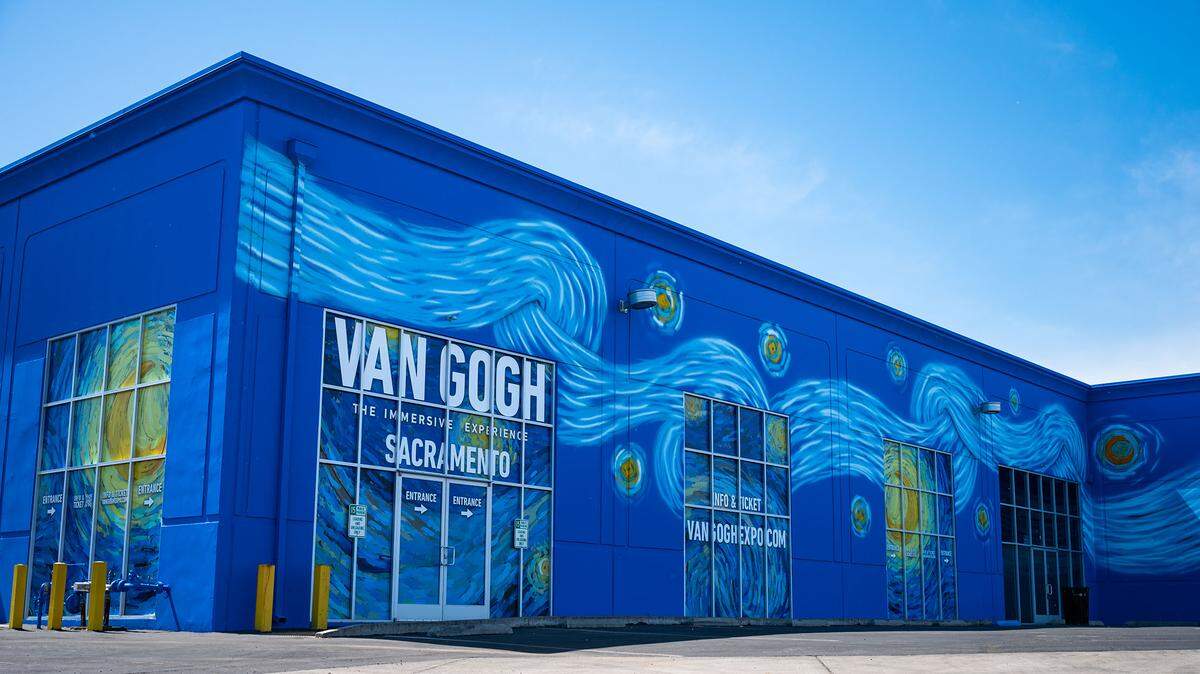 A building at 31 15th Street in West Sacramento, photographed on Wednesday, June 22, 2022, has been painted to be the entrance of a secretive Van Gogh immersive experience.