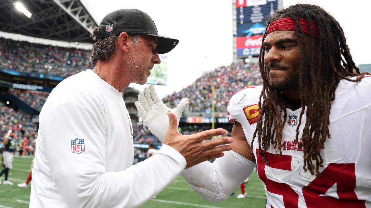 SEATTLE, WASHINGTON - SEPTEMBER 07: Head coach Kyle Shanahan of the San Francisco 49ers celebrates with Fred Warner #54 after defeating the Seattle Seahawks during the game at Lumen Field on September 07, 2025 in Seattle, Washington. (Photo by Steph Chambers/Getty Images)