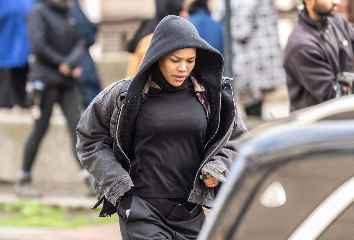 Actor Teyana Taylor walks to a vehicle as she takes part in the production of a Warner Bros. movie on Tuesday in downtown Sacramento.