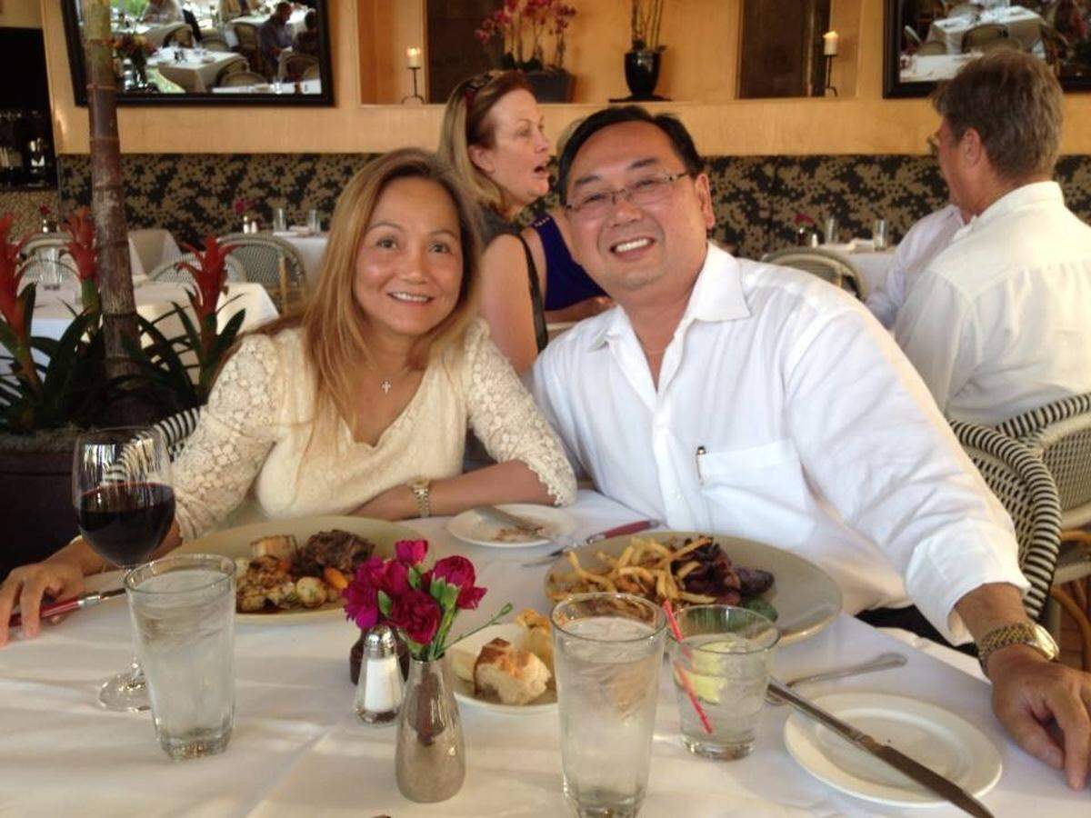 Dan Truong and his wife, Nga Nguyen, pose for a photo at The Waterboy restaurant in Sacramento in 2014.