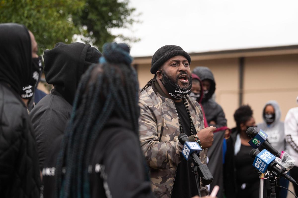 Berry Accius leads a press conference — called by family and friends of Kershawn Geyger to seek answers after an incident with Sacramento County Sheriff’s gang investigators in Carmichael led to his death — outside the sheriff’s North Area substation along Garfield Avenue on Friday, Jan. 22, 2021, in Sacramento County.