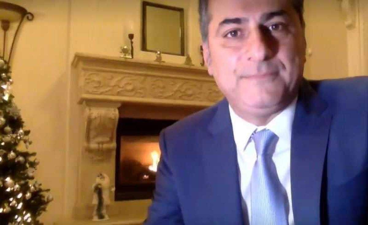In image taken from a livestream of the Dec. 15, 2020, Sacramento City Council meeting, Sean Loloee is seen from the interior of a home that matches the home owned by his wife, Maryam Seirafi. The councilman has previously told The Bee he lives in a home in his district, some 15 miles west.