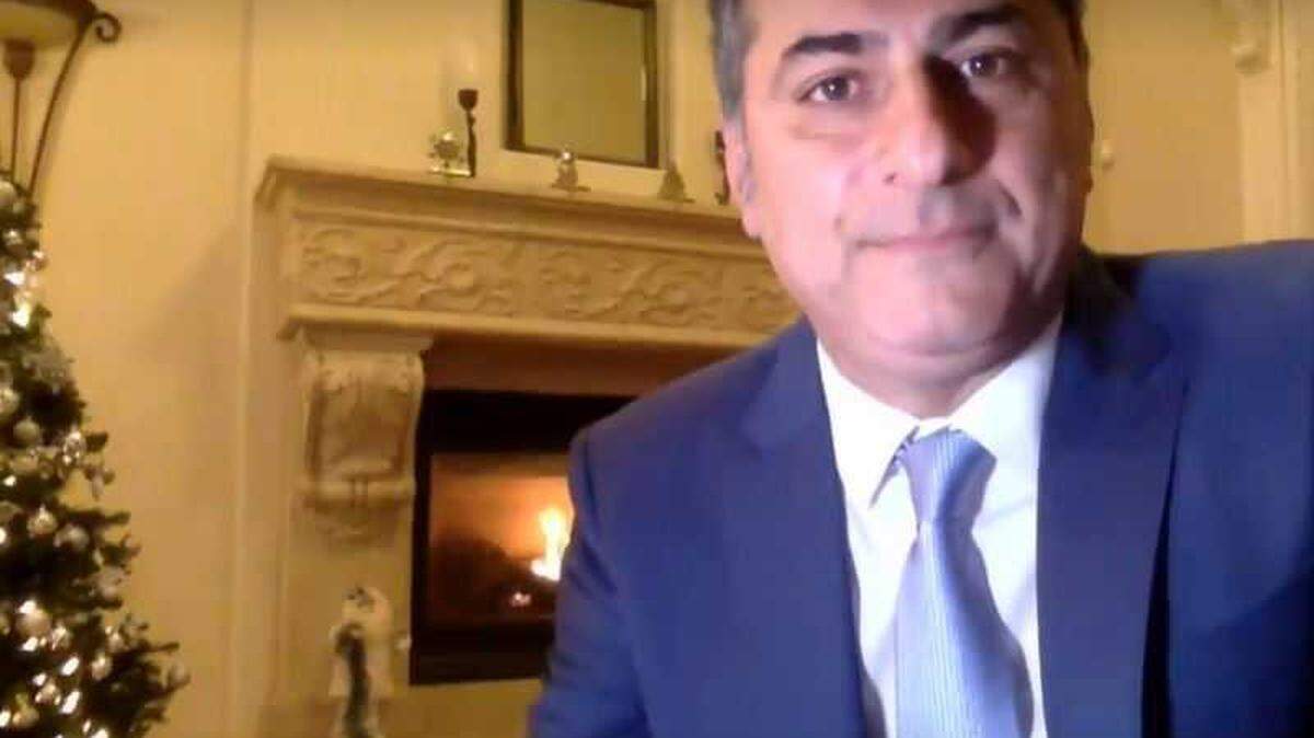 In image taken from a livestream of the Dec. 15, 2020, Sacramento City Council meeting, Sean Loloee is seen from the interior of a home that matches the home owned by his wife, Maryam Seirafi. The councilman has previous told The Bee he lives in a home in his district, some 15 miles west.