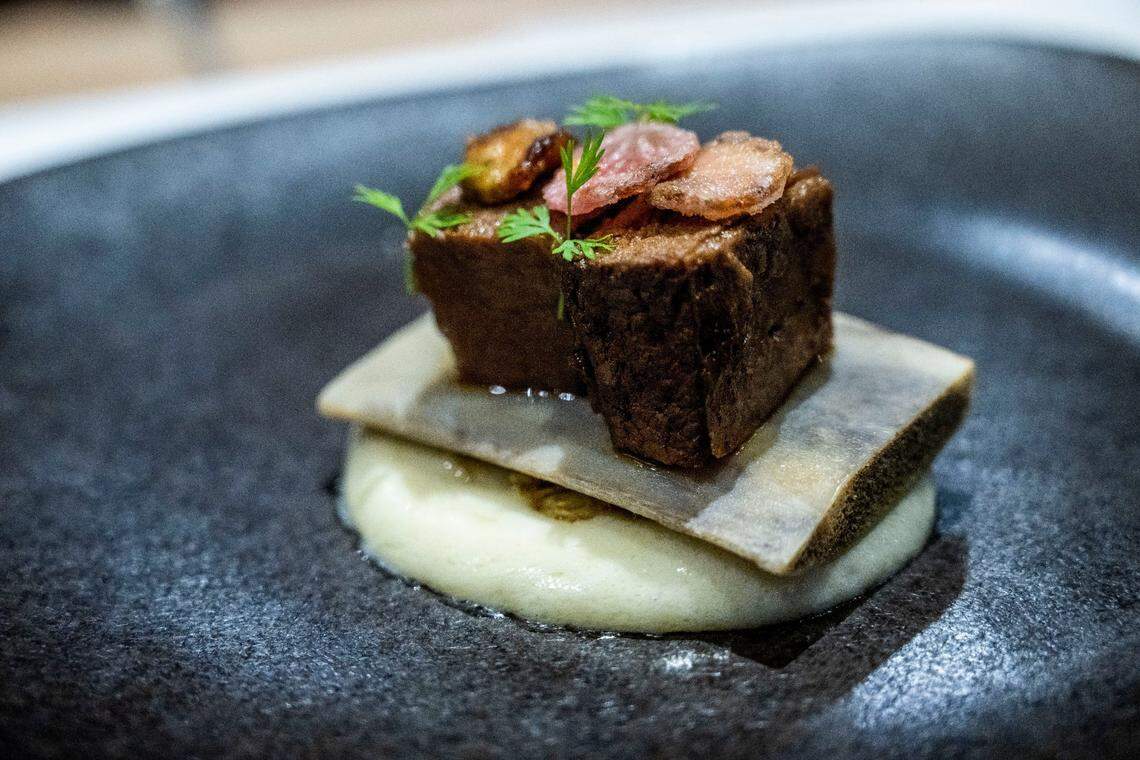 A plate of Korean-marinated, grass-fed short ribs “on the bone” with a white shoyu potato puree is part of the December 2022 tasting menu at Localis in midtown Sacramento. The restaurant’s seven- or 12-course tasting menu changes every month.
