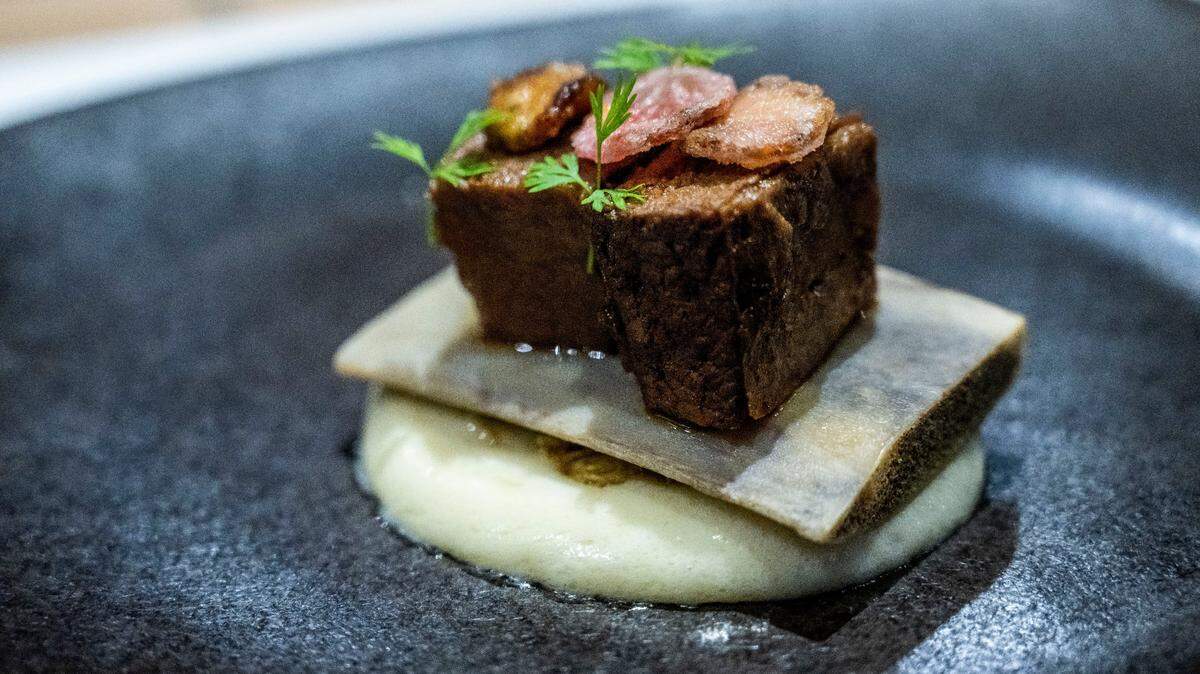 A plate of Korean-marinated, grass-fed short ribs “on the bone” with a white shoyu potato puree is part of the December 2022 tasting menu at Localis in midtown Sacramento. The restaurant’s seven- or 12-course tasting menu changes every month.
