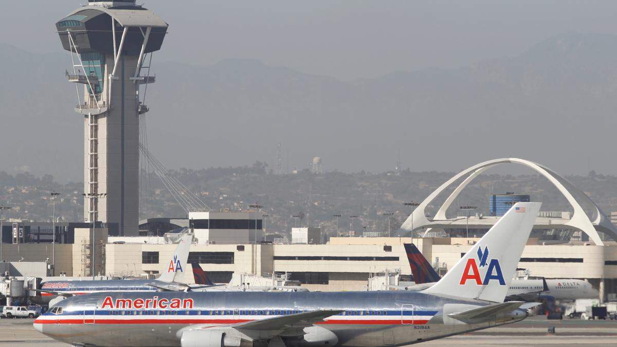 Timothy Armstrong was arrested for public intoxication after disrupting a flight from California to Utah, officials said. Video shows him growling and yelling.