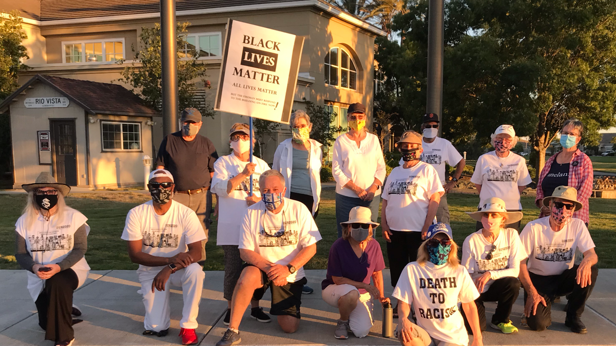 Residents of Rio Vista, California participate in a daily walk against racism on Monday, June 6, 2020.