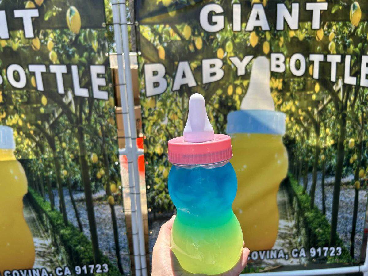 Giant Baby Bottle puts a fun twist on how they serve their sweet lemonade-- serving it in plastic, over-sized baby bottles. Patrons at the California State Fair can purchase a baby bottle of lemonade and earn one free refill.