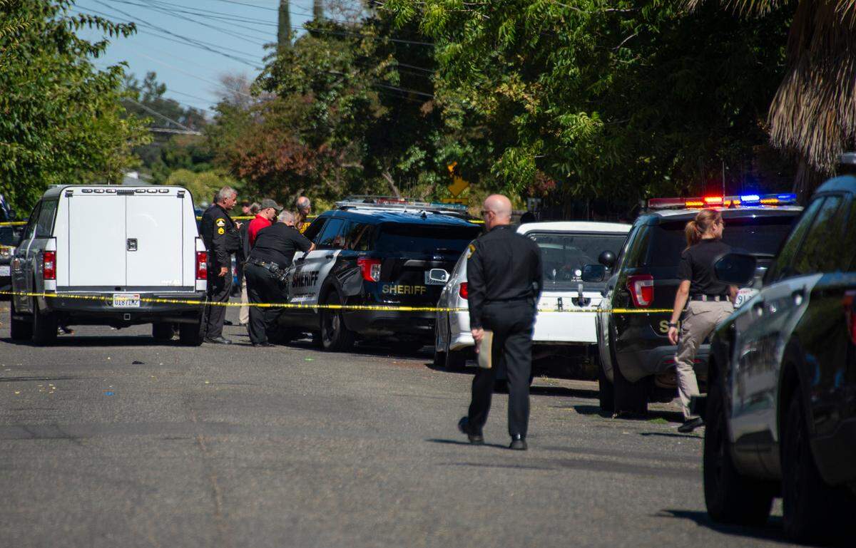 Sacramento County sheriff’s deputies investigate a deputy-involved shooting on Enrico Boulevard in south Sacramento on Wednesday, Sept. 28, 2022.