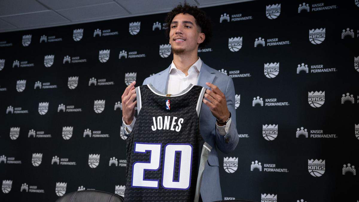 Sacramento Kings 34th pick Colby Jones on Tuesday, June 27, 2023 holds his jersey.