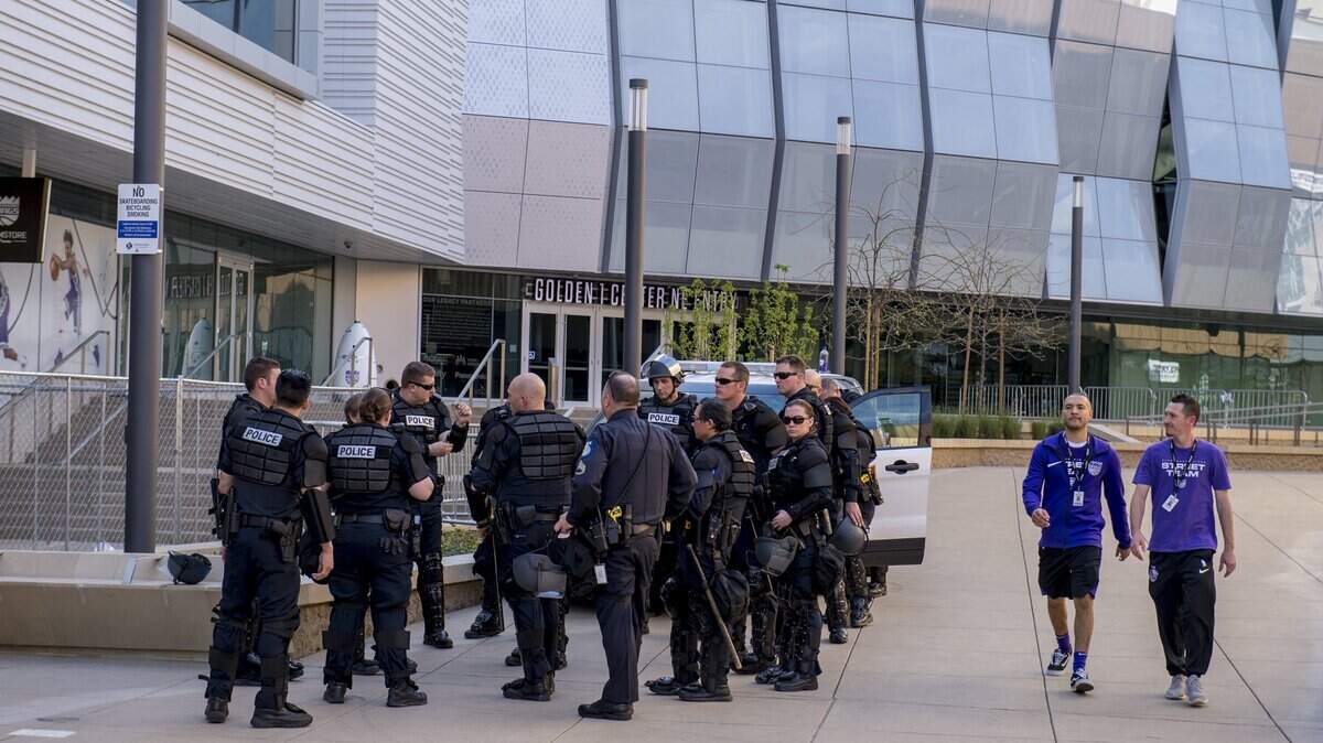 Sacramento police set up on David Stern Way, outside of Golden 1 Center, allowing only ticketed fans into the courtyard outside the arena on Thursday, March 29, 2018.